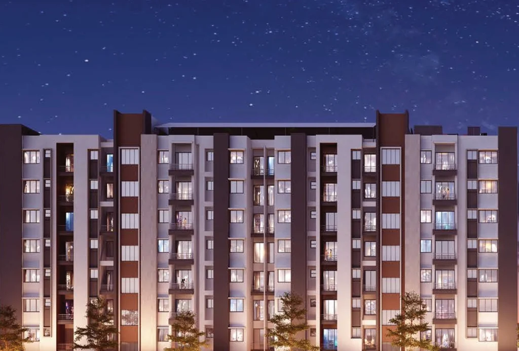 Modern kitchen design in affordable Betkuchi flats – Achyut Meadows