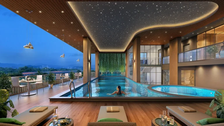 Achyut Skyhigh Beltola Guwahati – Indoor Swimming Pool with Deck Seating and Star Ceiling