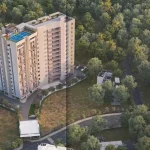 Aerial view of Golden Woods Umang II surrounded by greenery in Lokhra, Guwahati